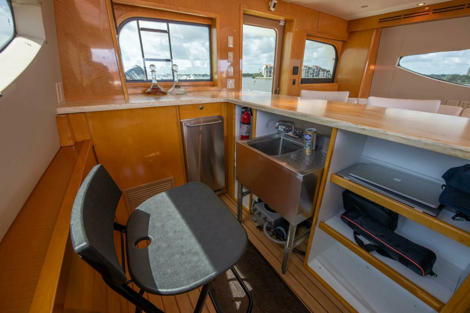 a kitchen with a sink and a window aboard TIME-2 FLY Yacht for Sale