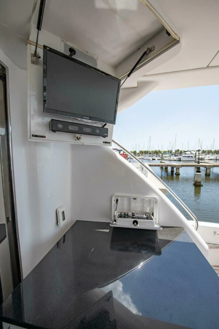 a machine on the deck aboard TIME-2 FLY Yacht for Sale