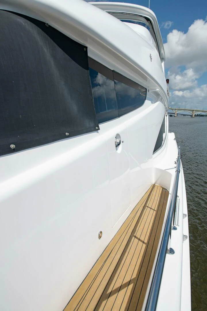 a white car with a door open aboard TIME-2 FLY Yacht for Sale