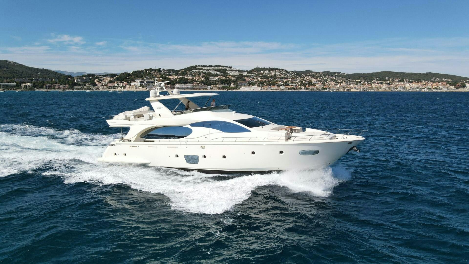 a white yacht on the water aboard EVA Yacht for Sale