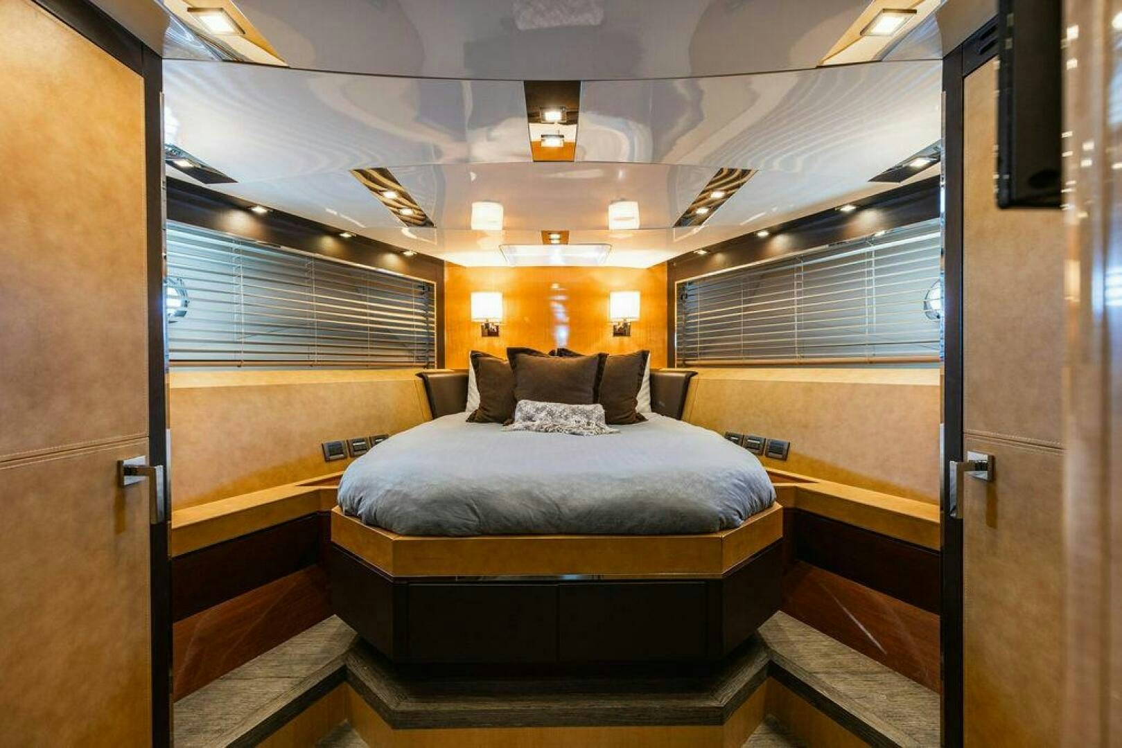 a room with a bed and a window aboard KNOT GUILTY Yacht for Sale