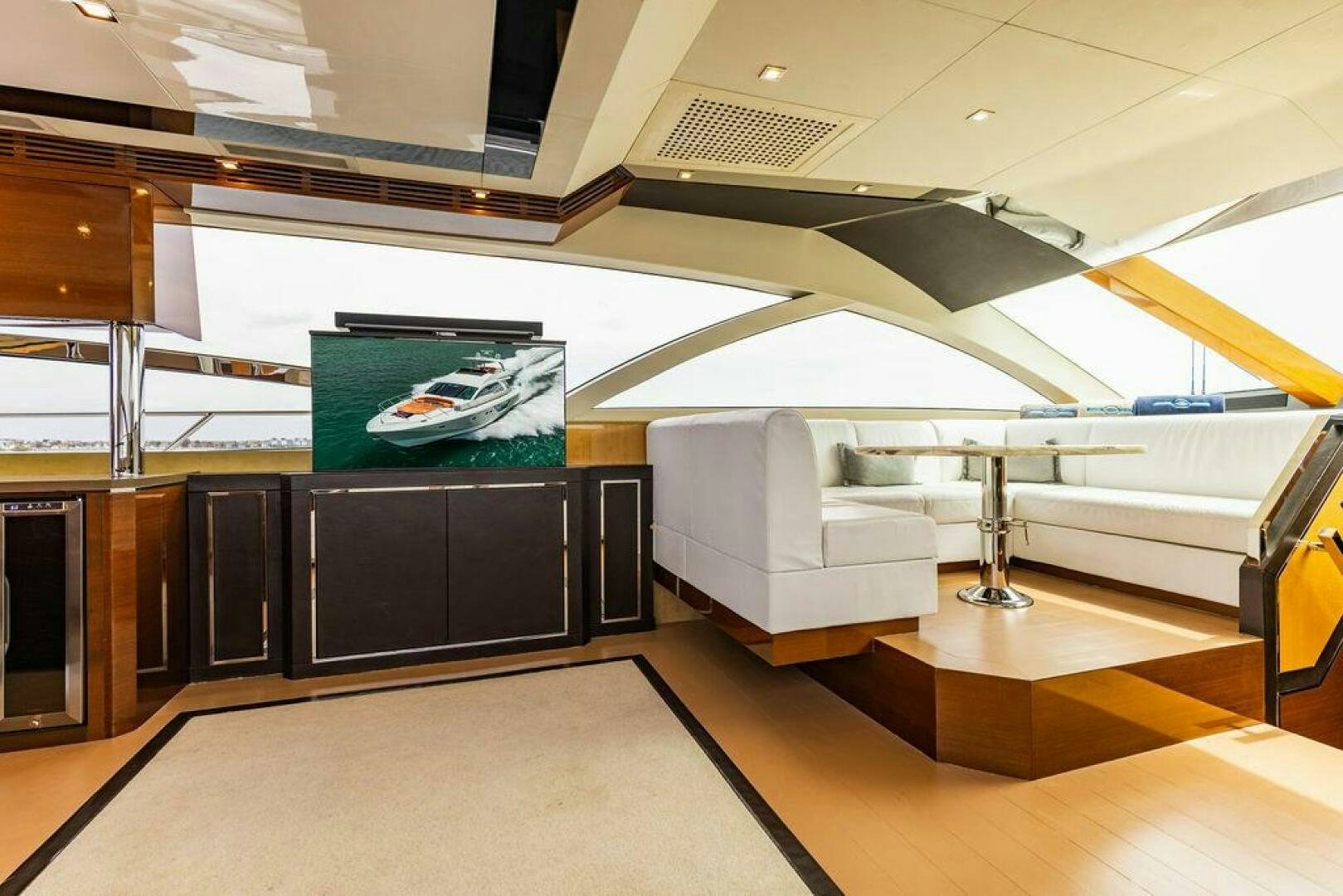 a room with a large screen aboard KNOT GUILTY Yacht for Sale