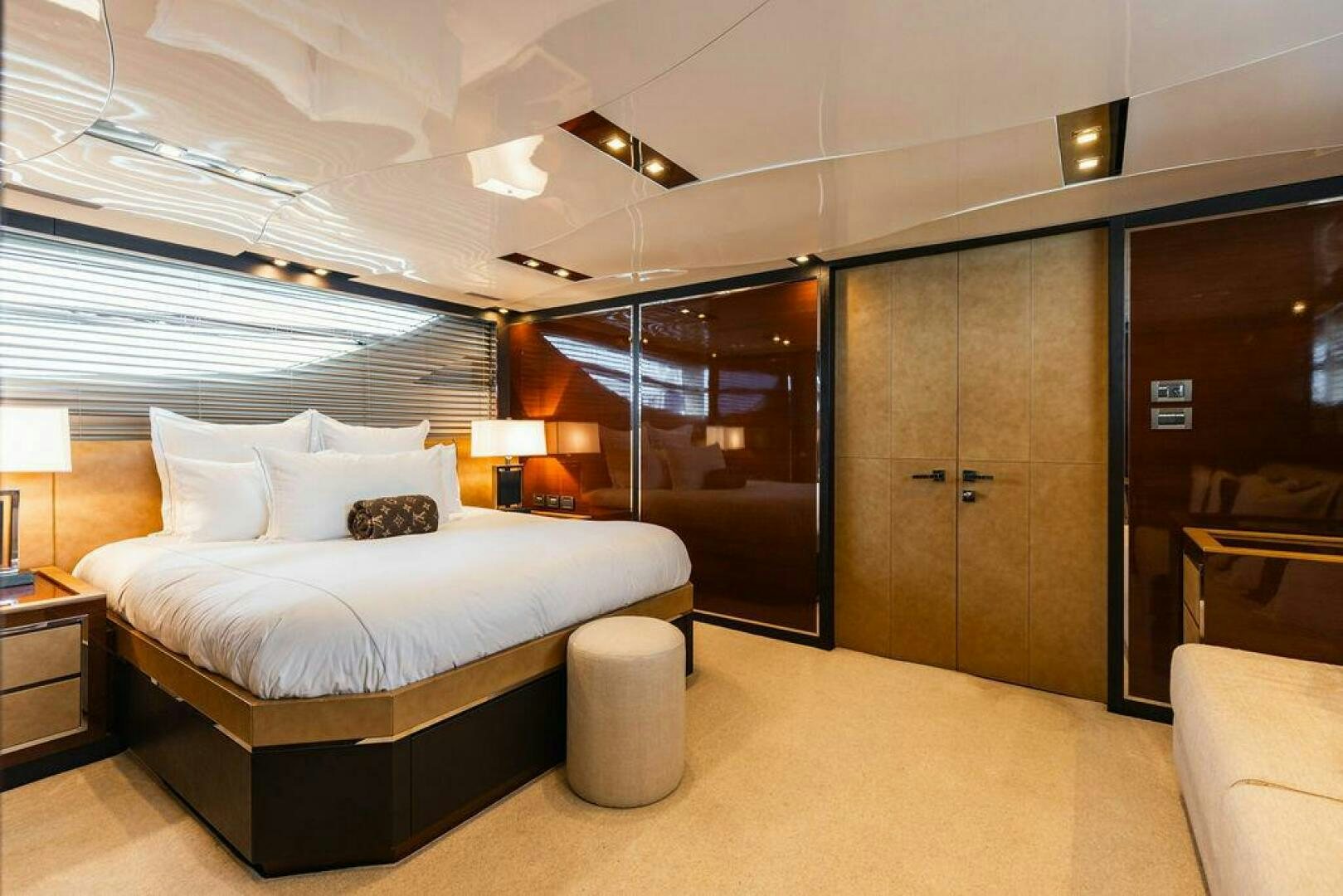 a large bedroom with a large bed aboard KNOT GUILTY Yacht for Sale