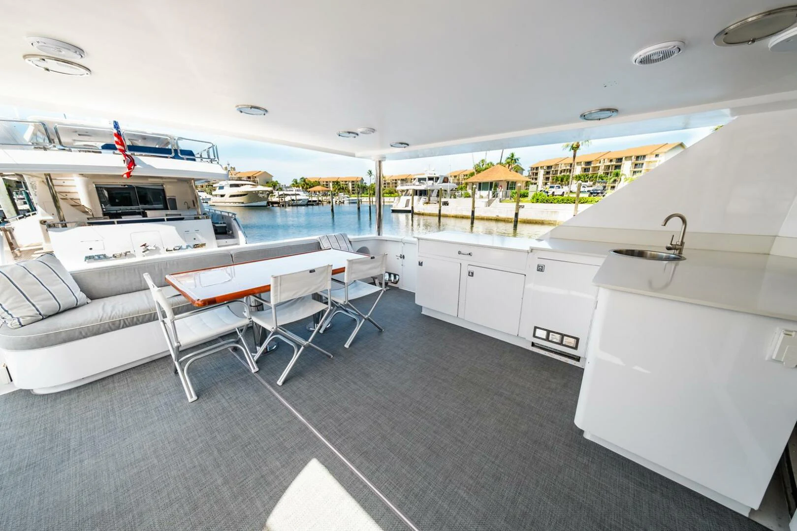 a large white boat in a large body of water aboard GRACE Yacht for Sale