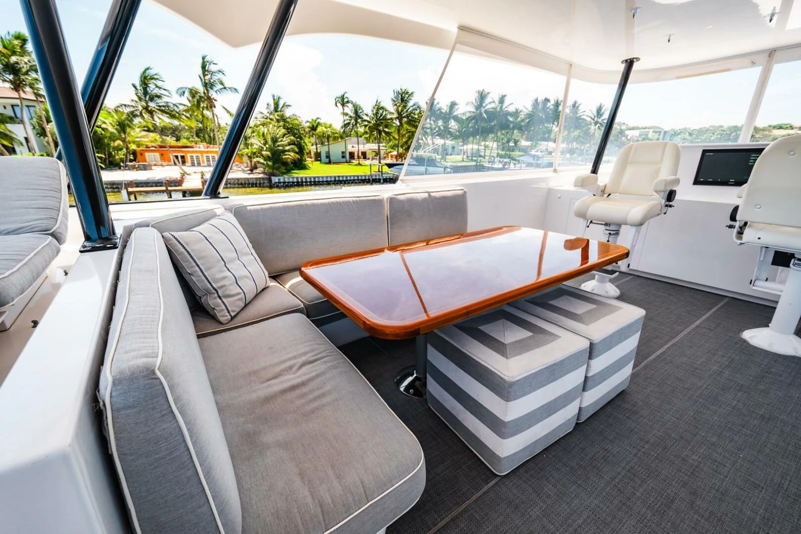 a living room with a couch and a table aboard GRACE Yacht for Sale