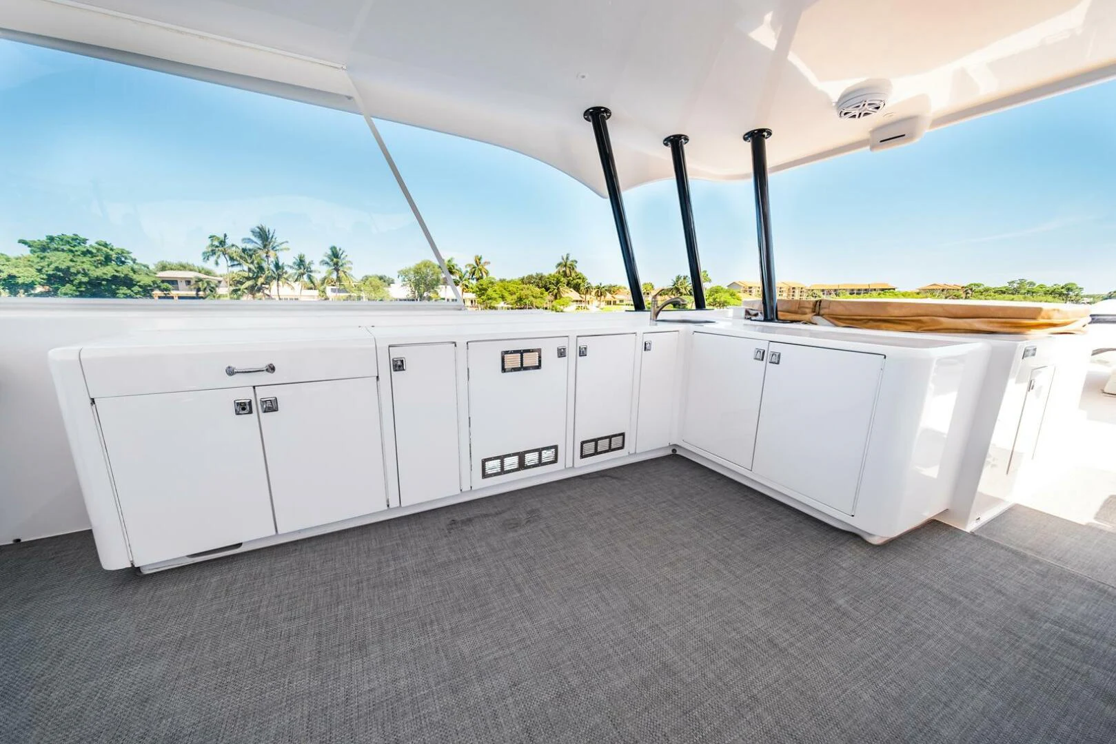 a white garage with a black pole aboard GRACE Yacht for Sale