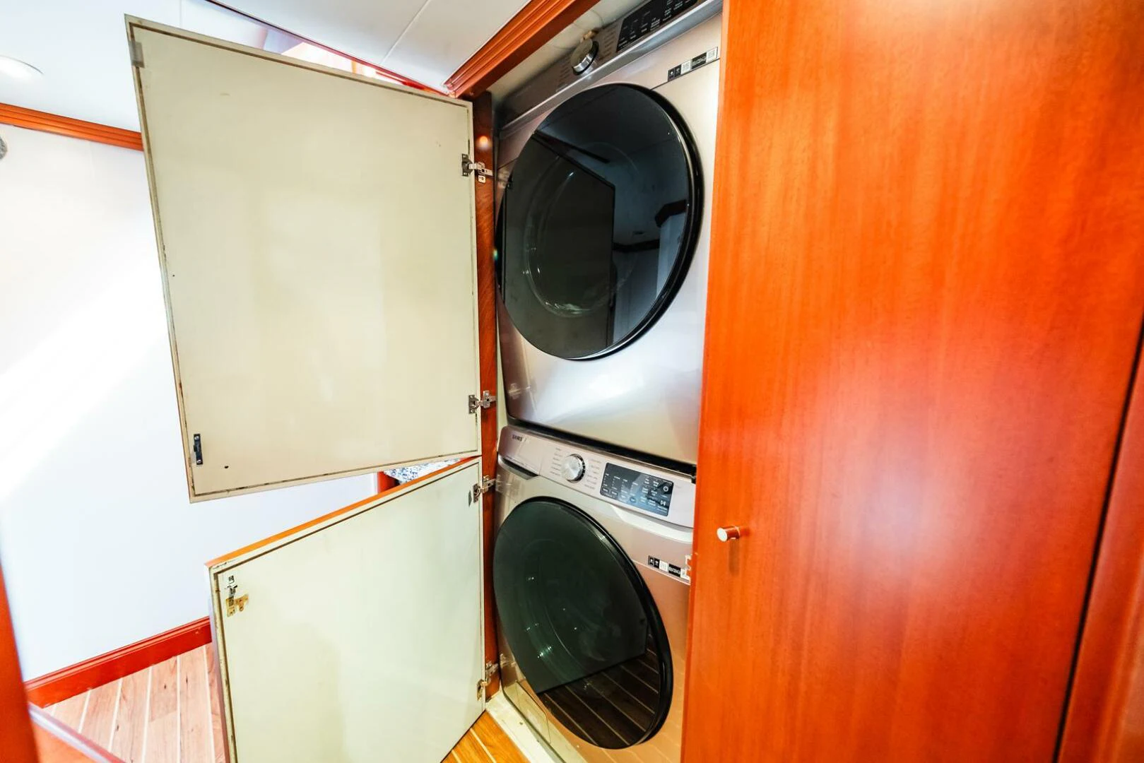 a washer and dryer in a room aboard GRACE Yacht for Sale