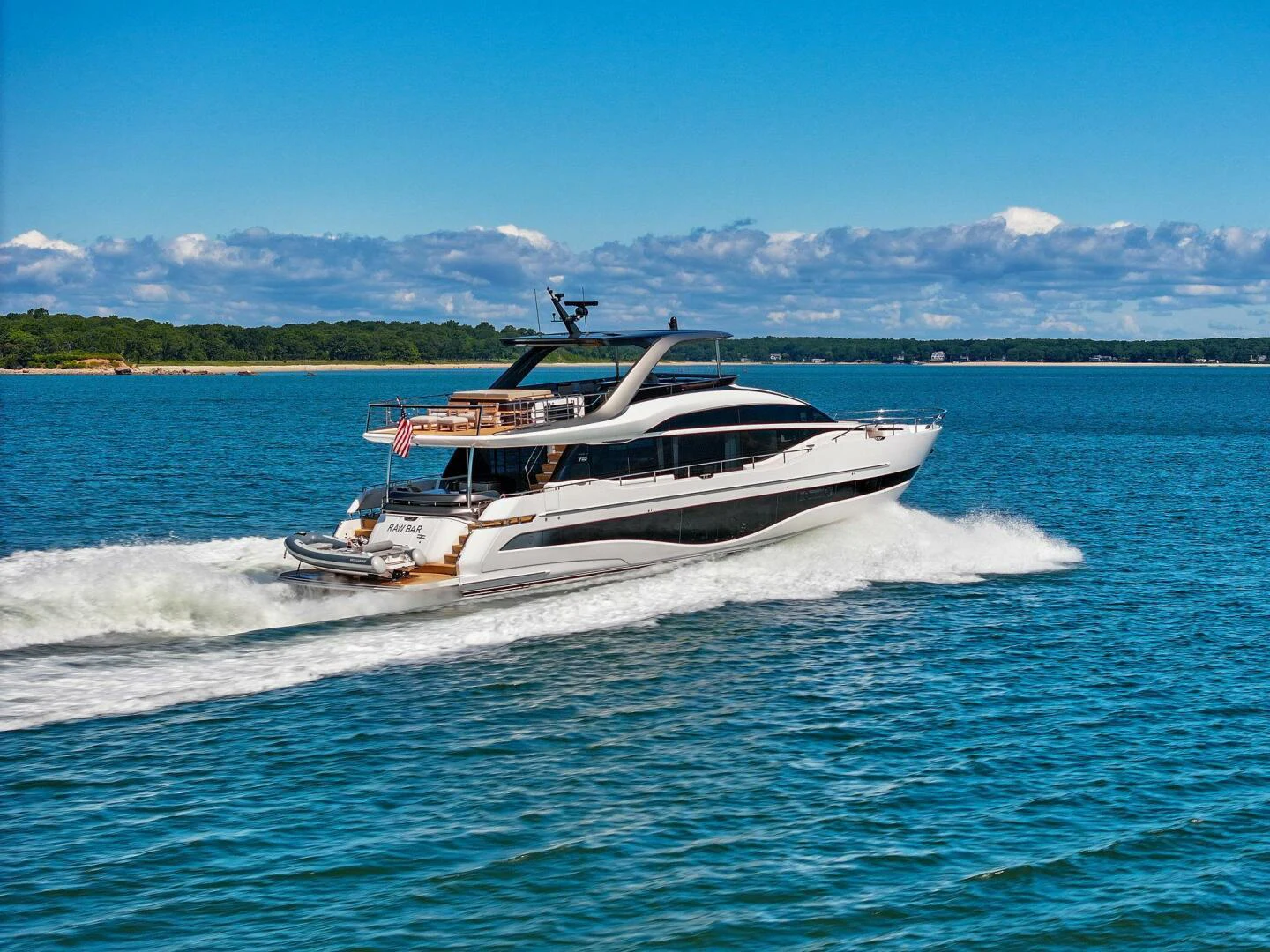 a boat on the water aboard RAW BAR Yacht for Sale