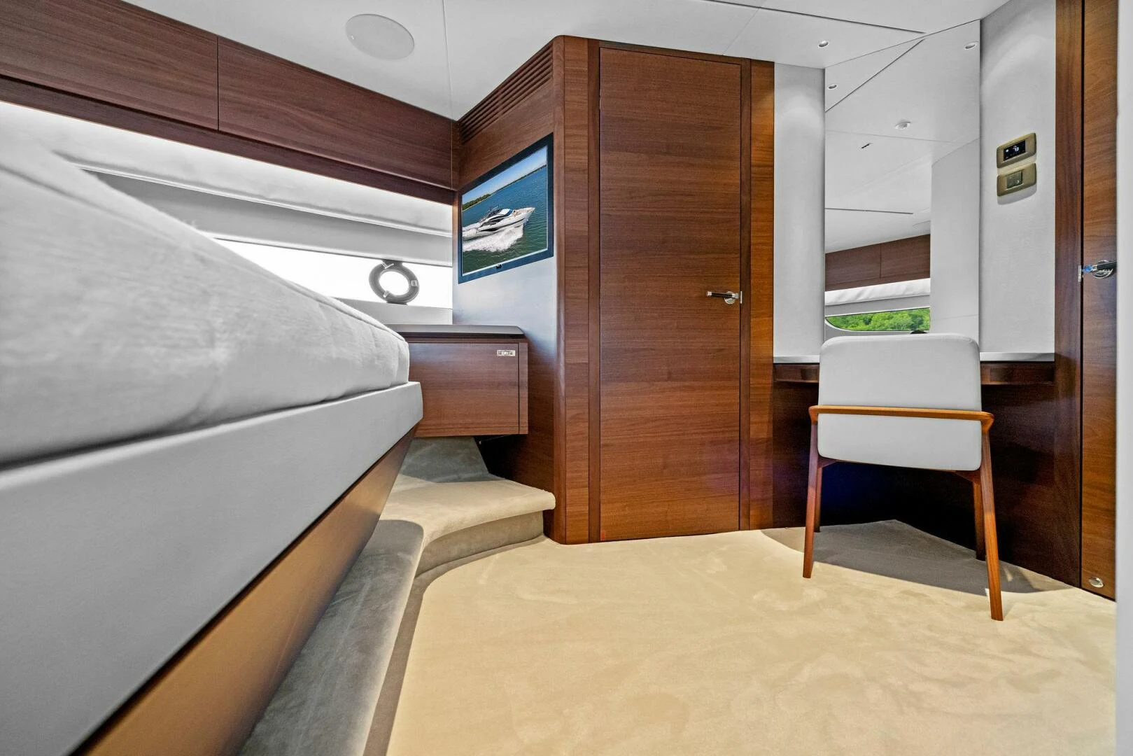 a room with a bed and a desk aboard RAW BAR Yacht for Sale