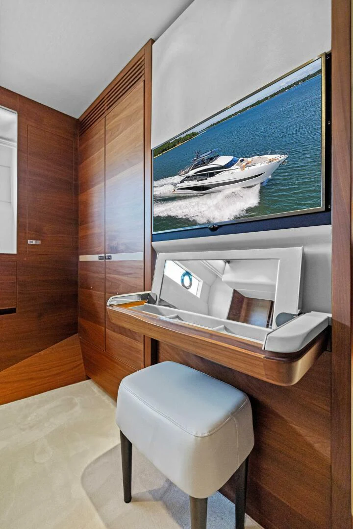 a tv on a stand aboard RAW BAR Yacht for Sale