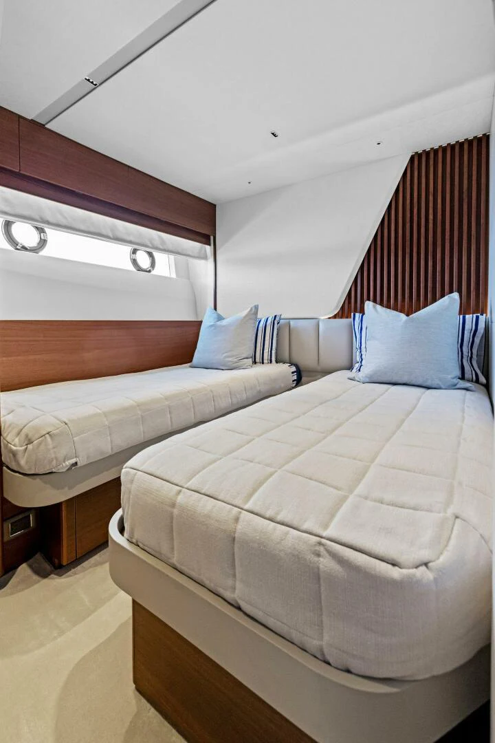 a couple of beds in a room aboard RAW BAR Yacht for Sale