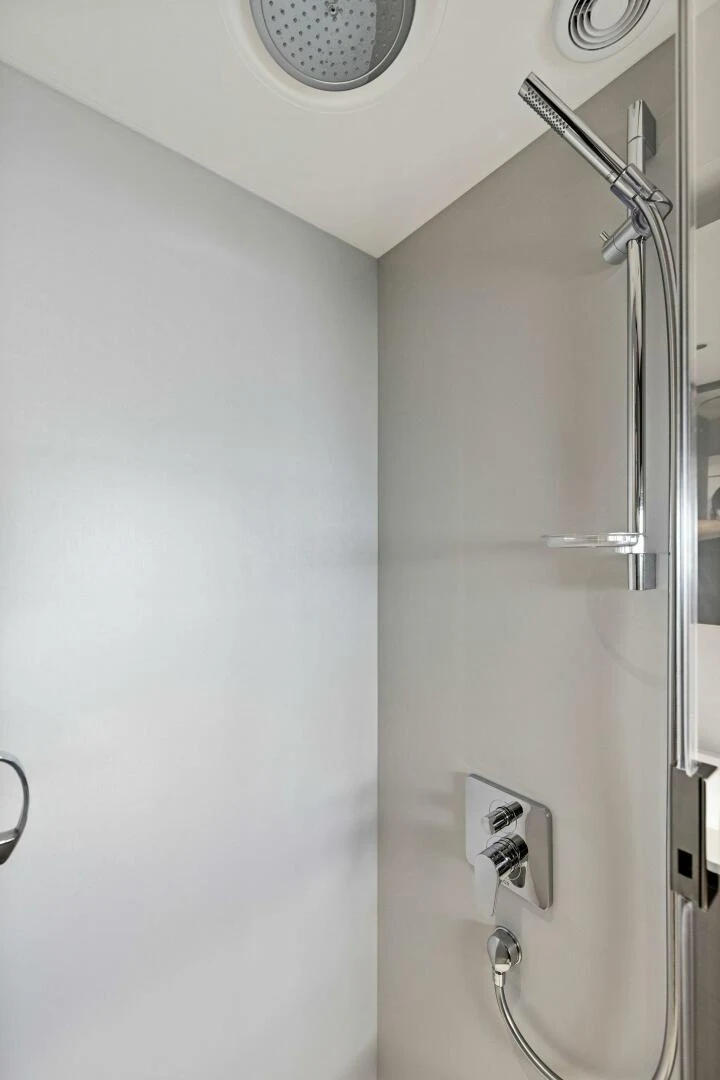 a shower with a metal handle aboard RAW BAR Yacht for Sale