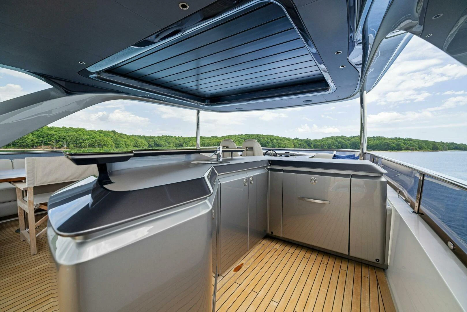 a boat with a large window aboard RAW BAR Yacht for Sale