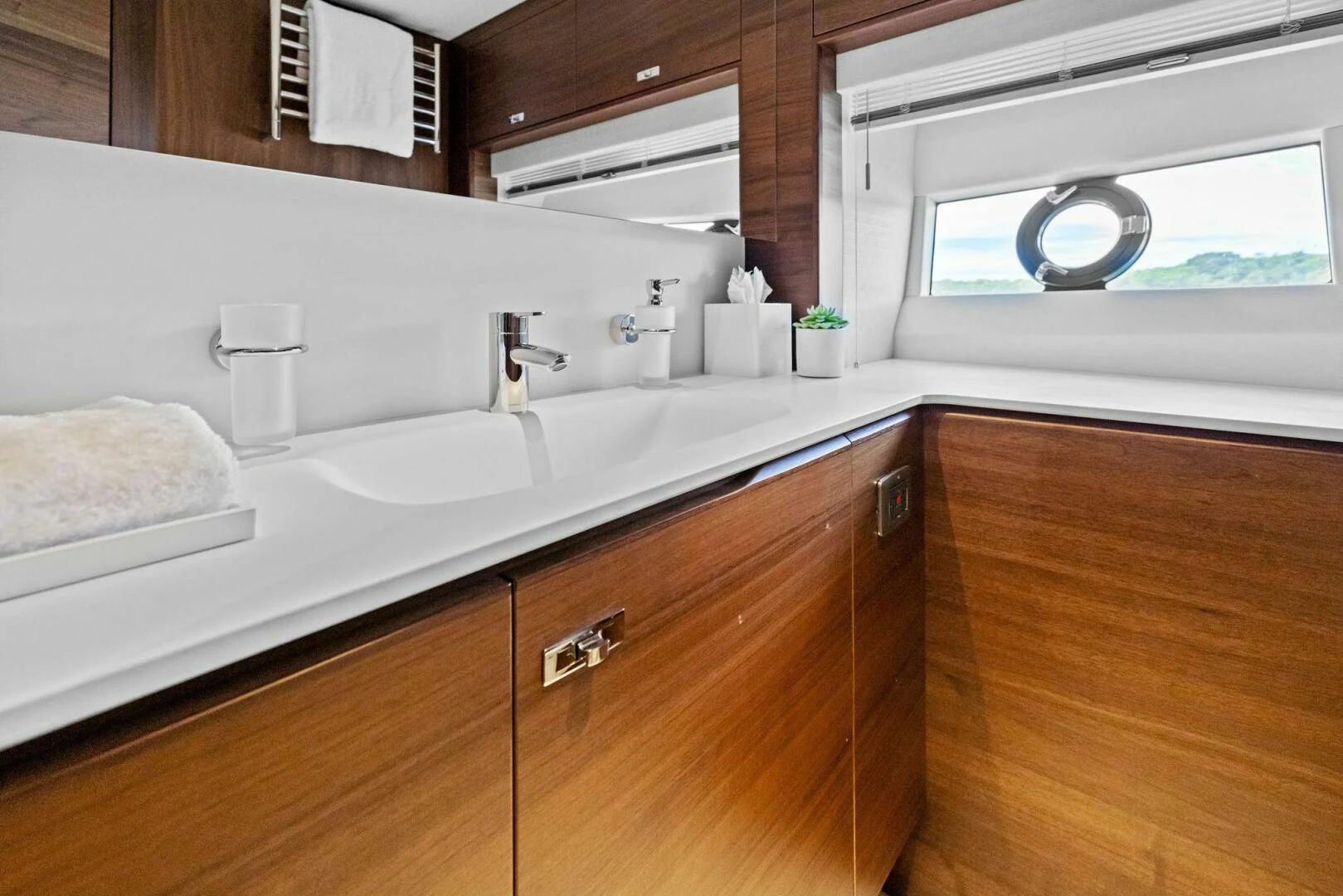 a kitchen with a large sink aboard RAW BAR Yacht for Sale