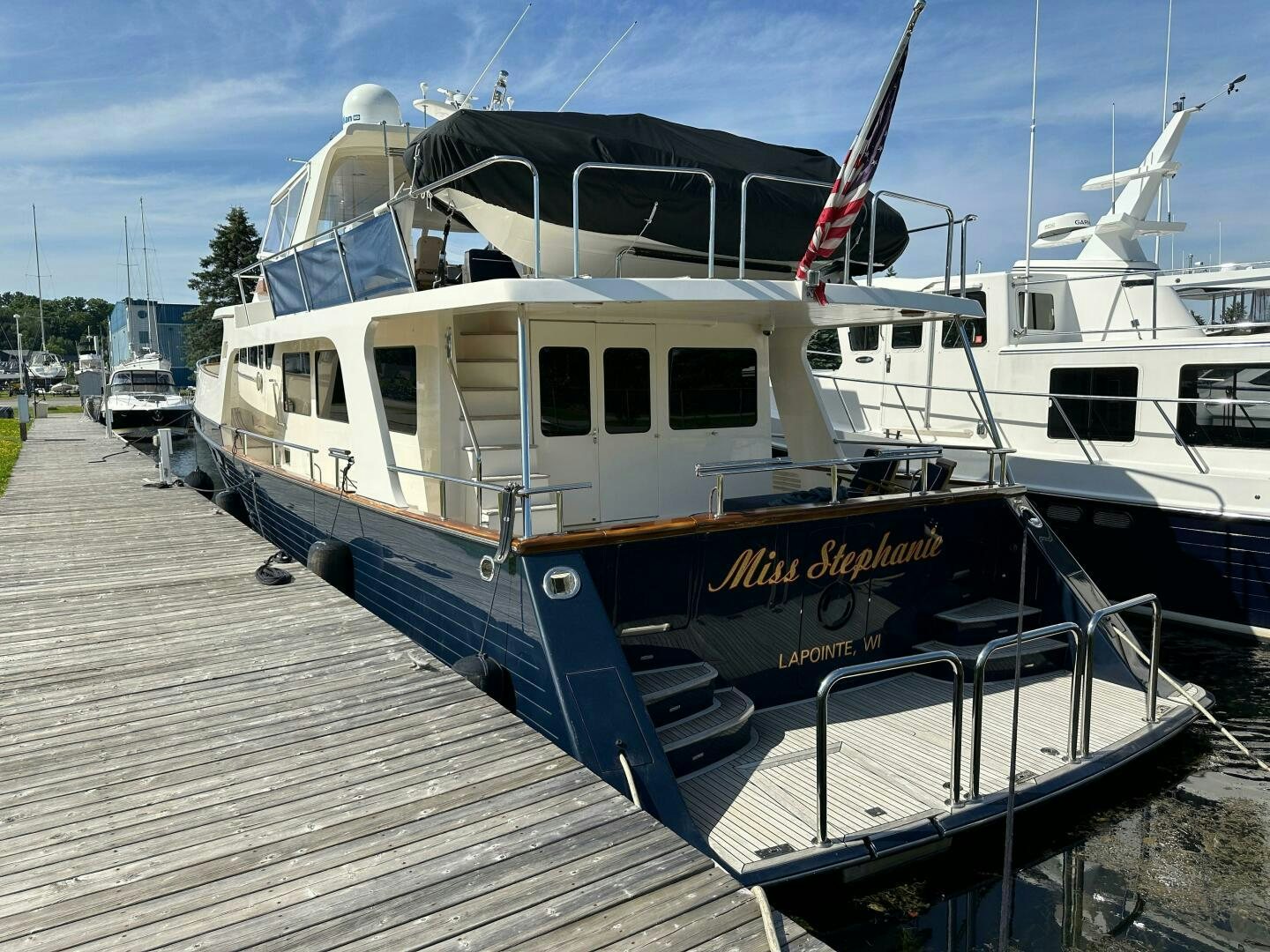 a boat docked at a pier aboard MISS STEPHANIE  Yacht for Sale