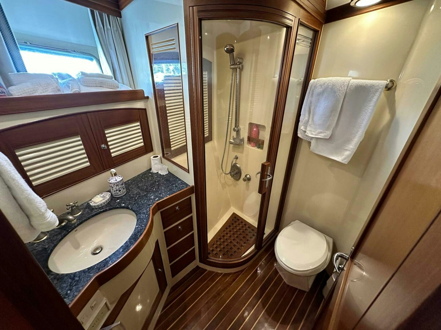 a bathroom with a sink and a shower aboard MISS STEPHANIE  Yacht for Sale
