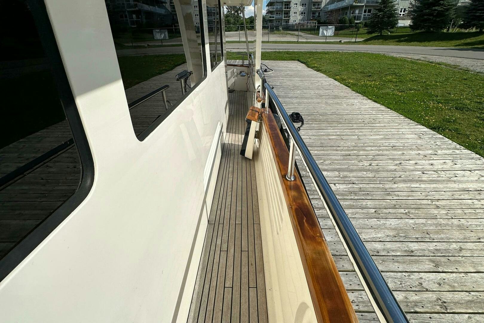 a wooden bridge over a body of water aboard MISS STEPHANIE  Yacht for Sale