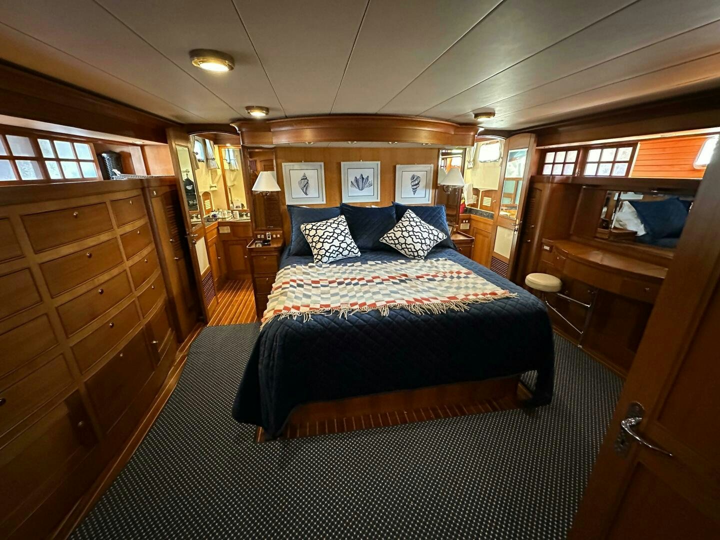 a bed in a room aboard MISS STEPHANIE  Yacht for Sale