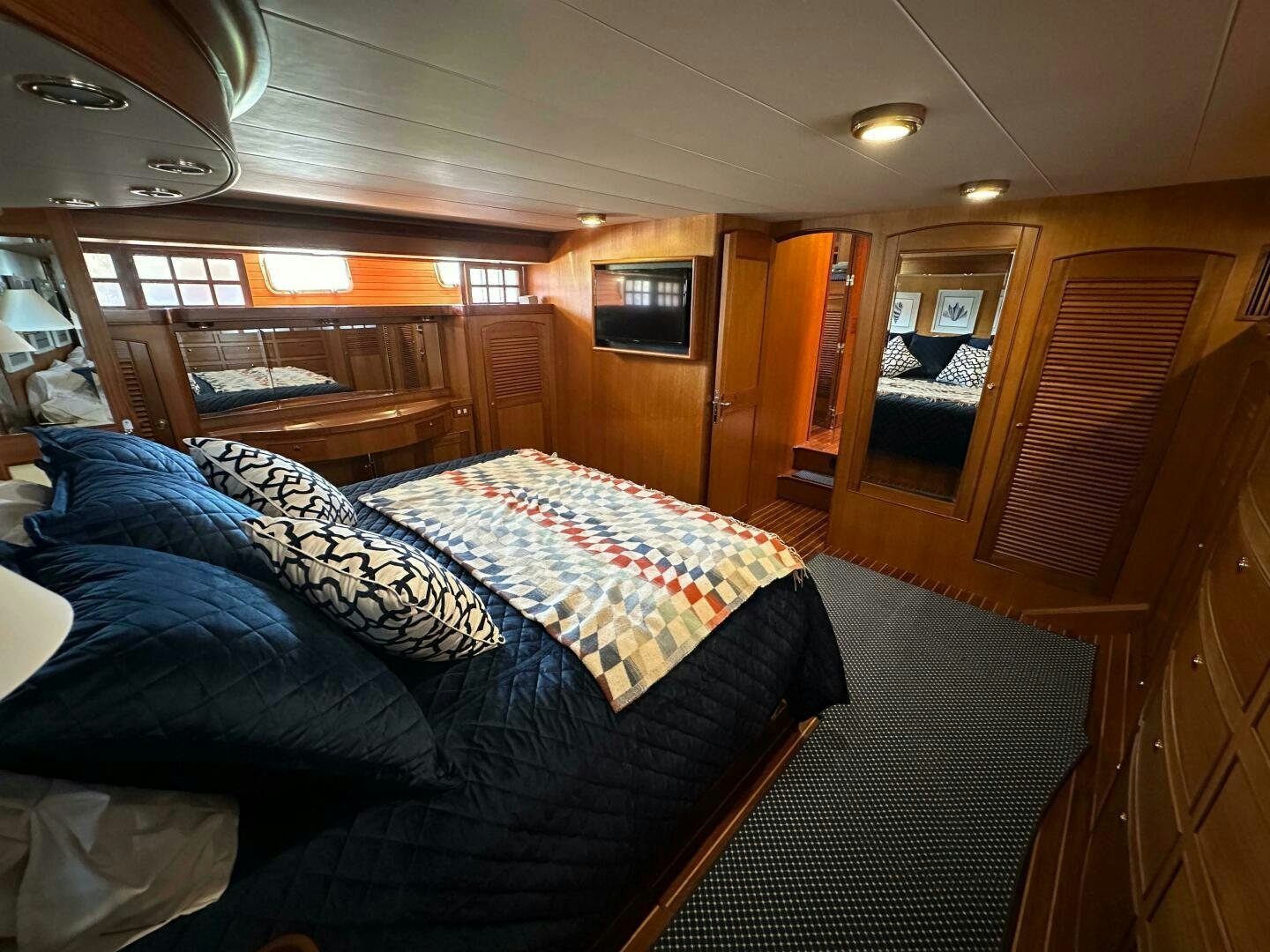 a bedroom with a bed aboard MISS STEPHANIE  Yacht for Sale