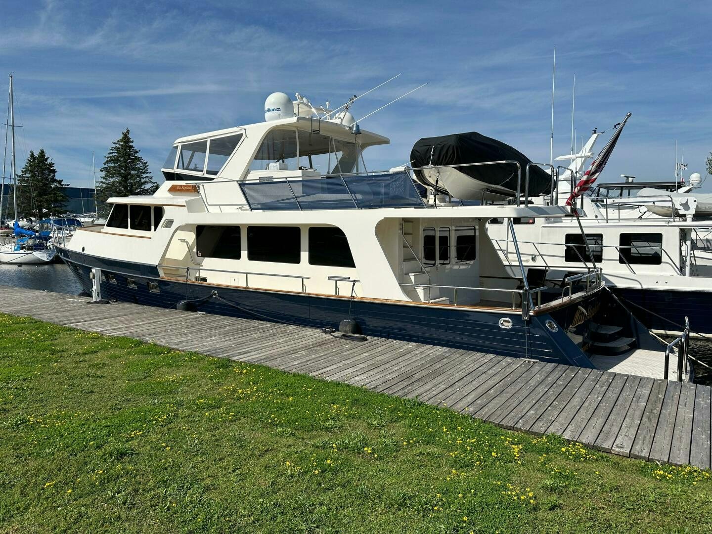 a boat parked on the grass aboard MISS STEPHANIE  Yacht for Sale