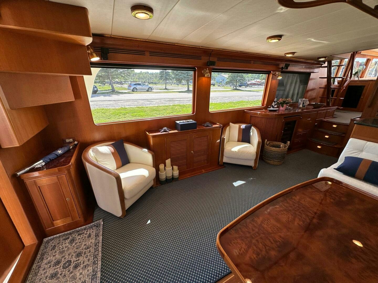 a room with a bed and a chair aboard MISS STEPHANIE  Yacht for Sale