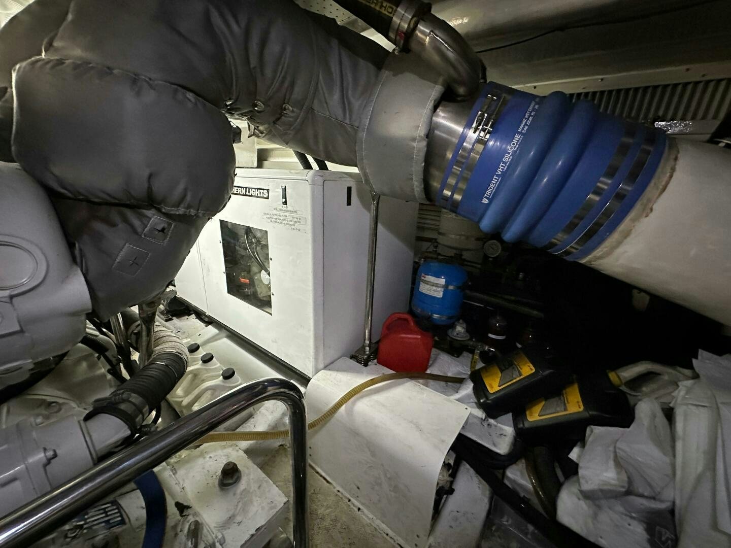a car mechanic working on a car aboard MISS STEPHANIE  Yacht for Sale
