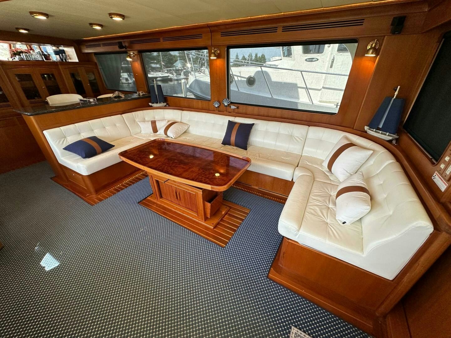 a room with a bed and a table aboard MISS STEPHANIE  Yacht for Sale