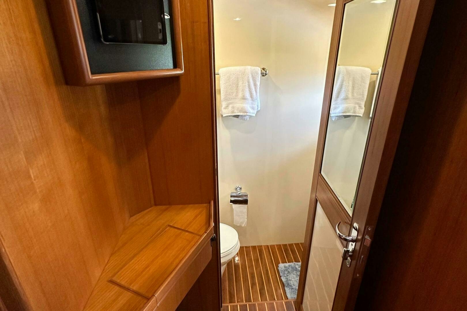 a bathroom with a glass shower aboard MISS STEPHANIE  Yacht for Sale