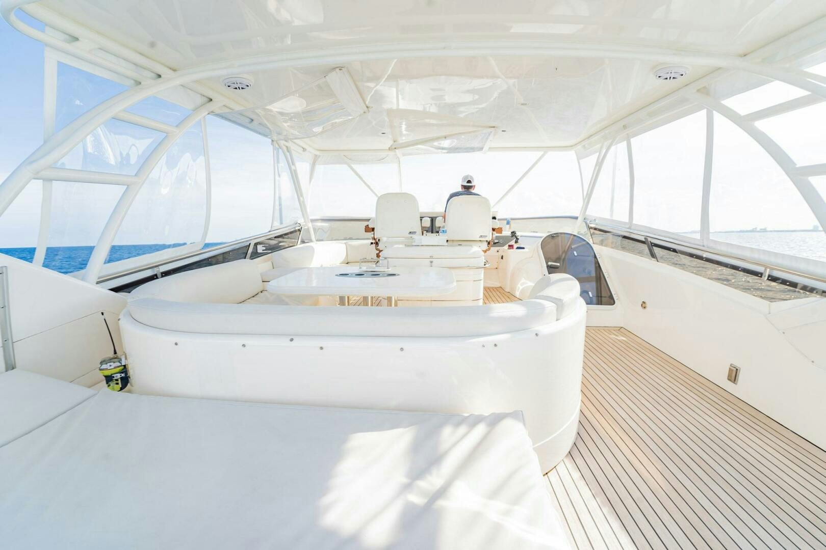 a white boat in a large room aboard HALF MINE Yacht for Sale