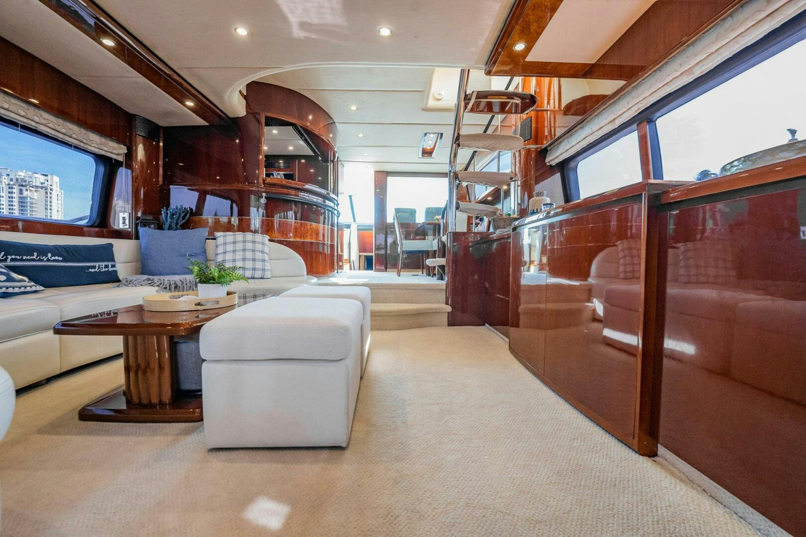 a room with a couch and a table aboard HALF MINE Yacht for Sale