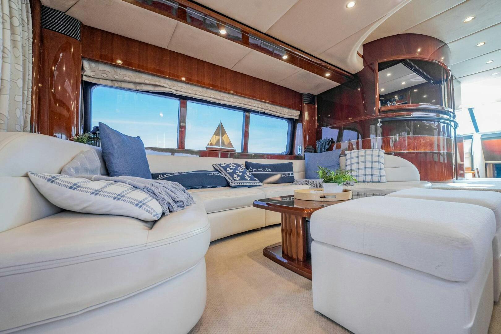 a living room with a large window aboard HALF MINE Yacht for Sale