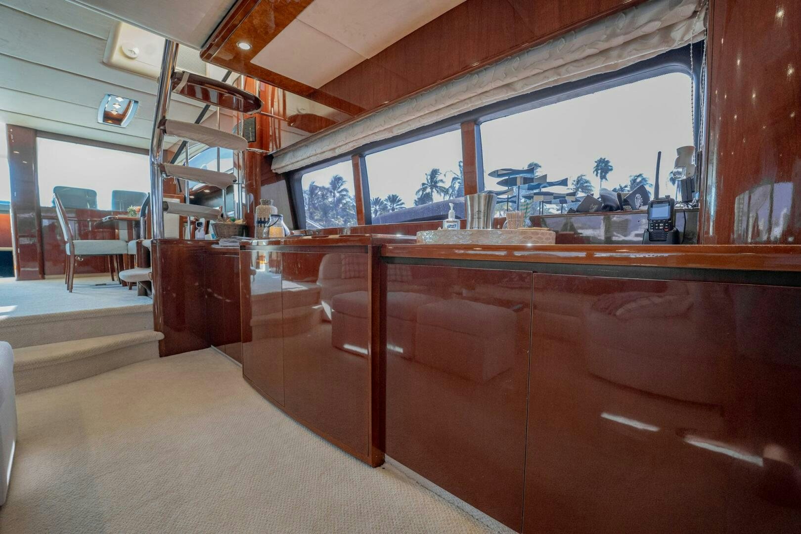 a room with a desk and chairs aboard HALF MINE Yacht for Sale