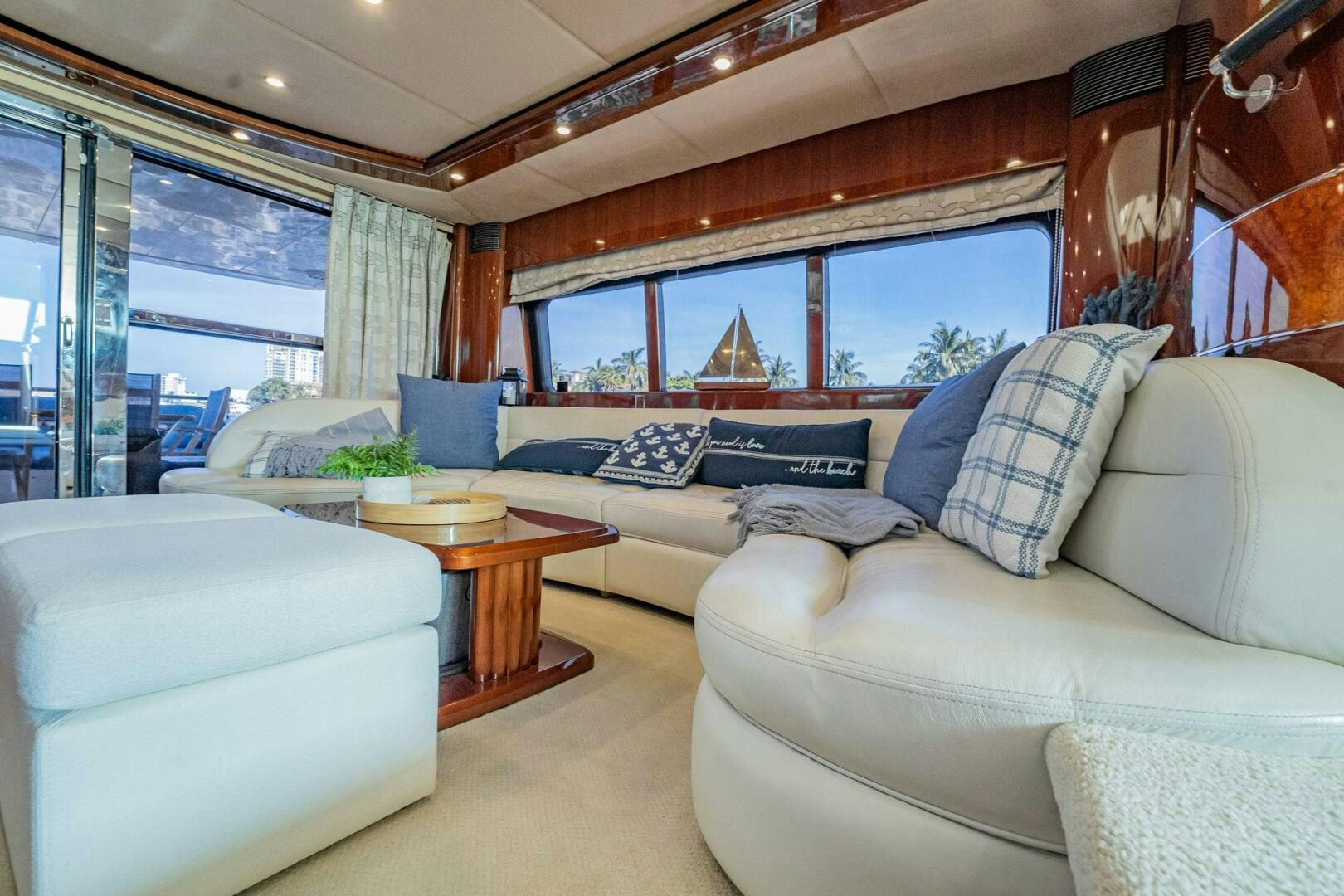 a living room with a large window aboard HALF MINE Yacht for Sale
