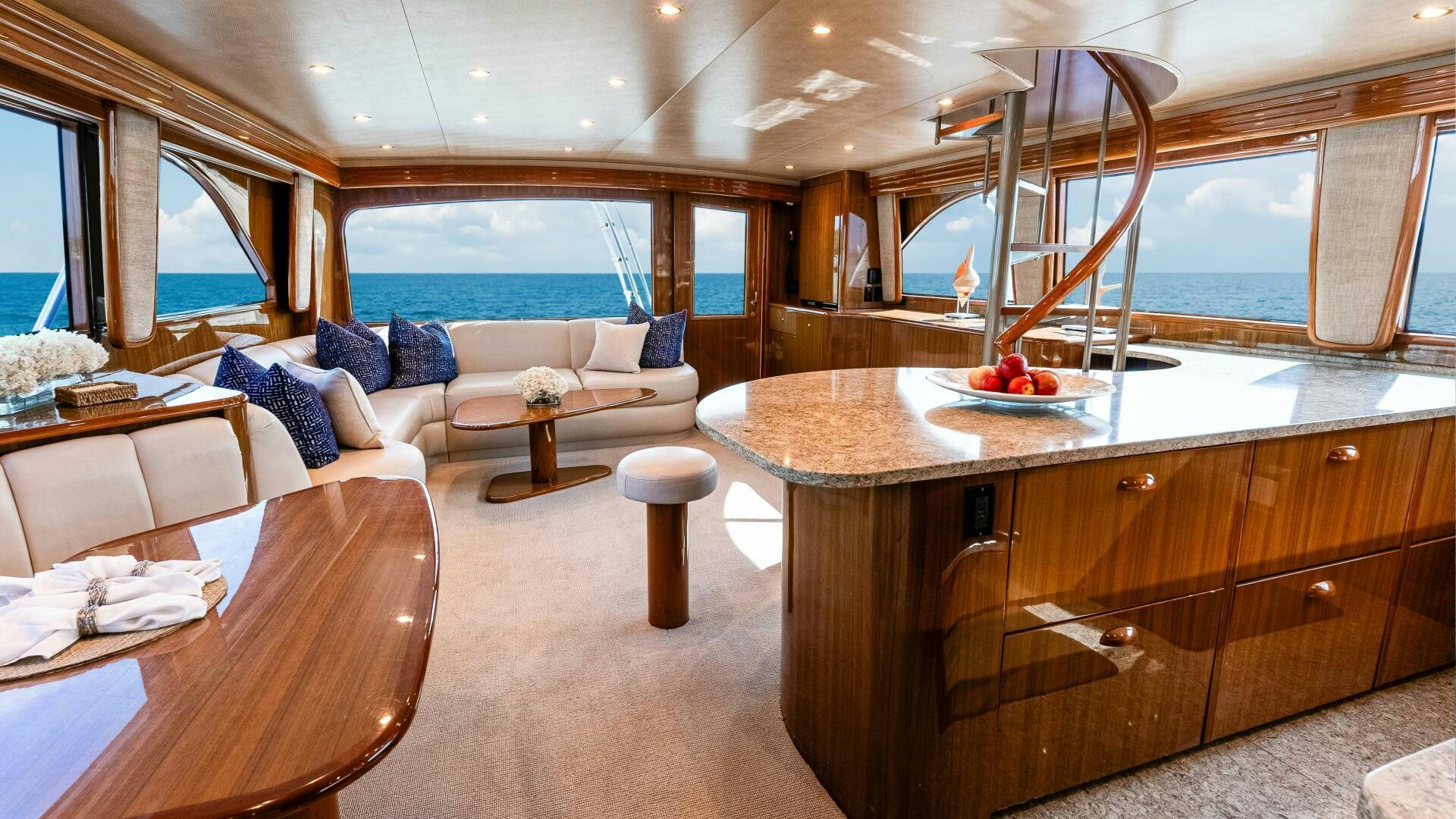 a modern looking living room with a large window aboard BLUE EYES Yacht for Sale