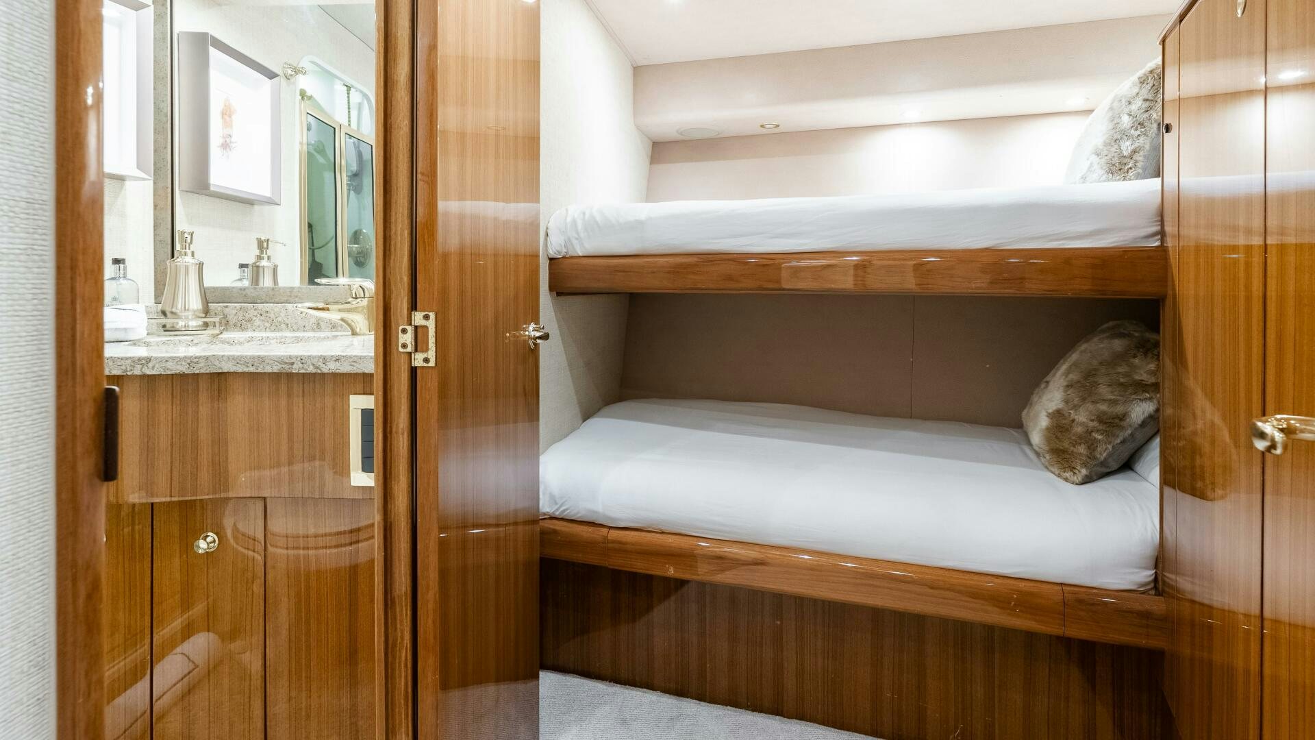 a bed in a room aboard BLUE EYES Yacht for Sale