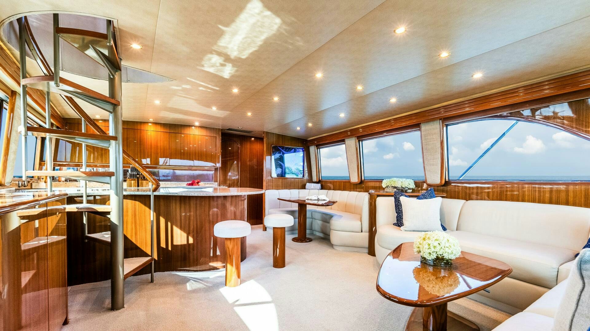 a room with a couch and a table and a window aboard BLUE EYES Yacht for Sale