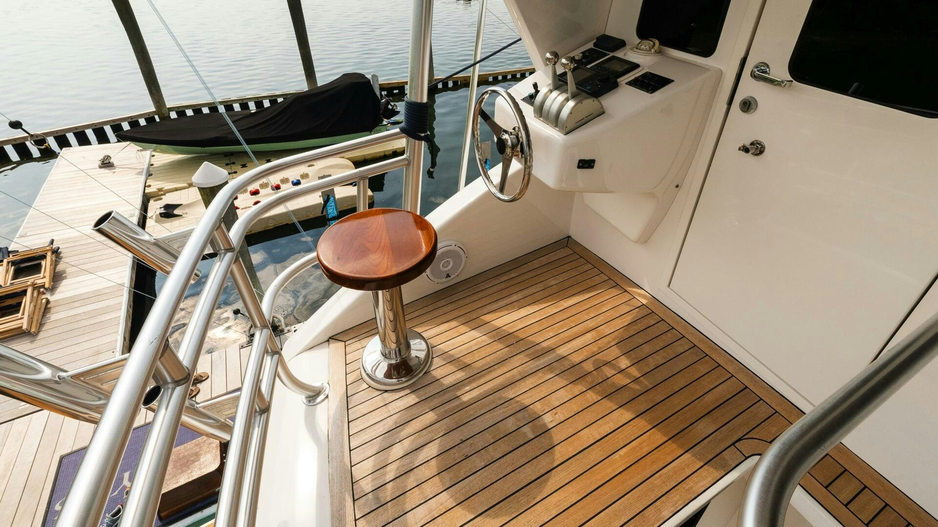 a boat with a seat aboard BLUE EYES Yacht for Sale
