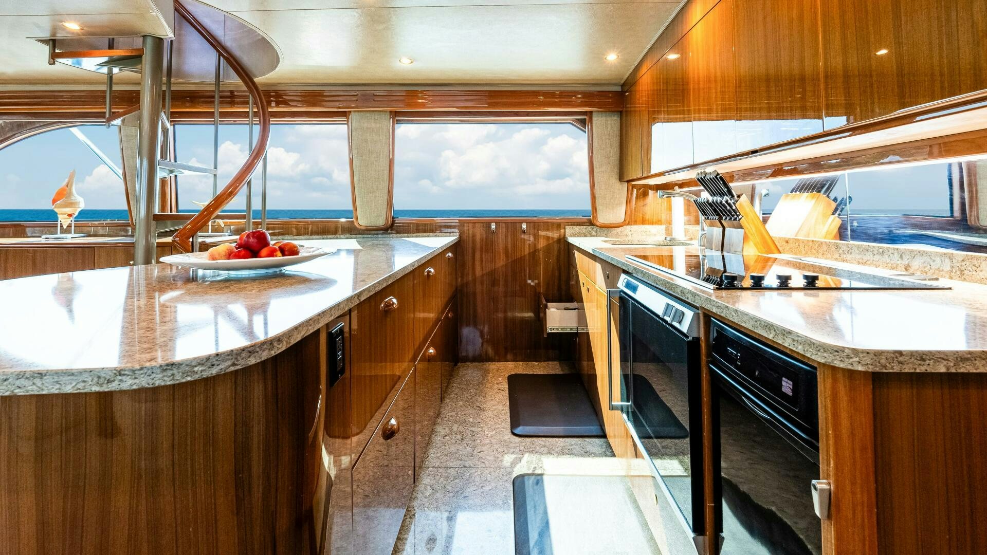 a kitchen with a large island aboard BLUE EYES Yacht for Sale