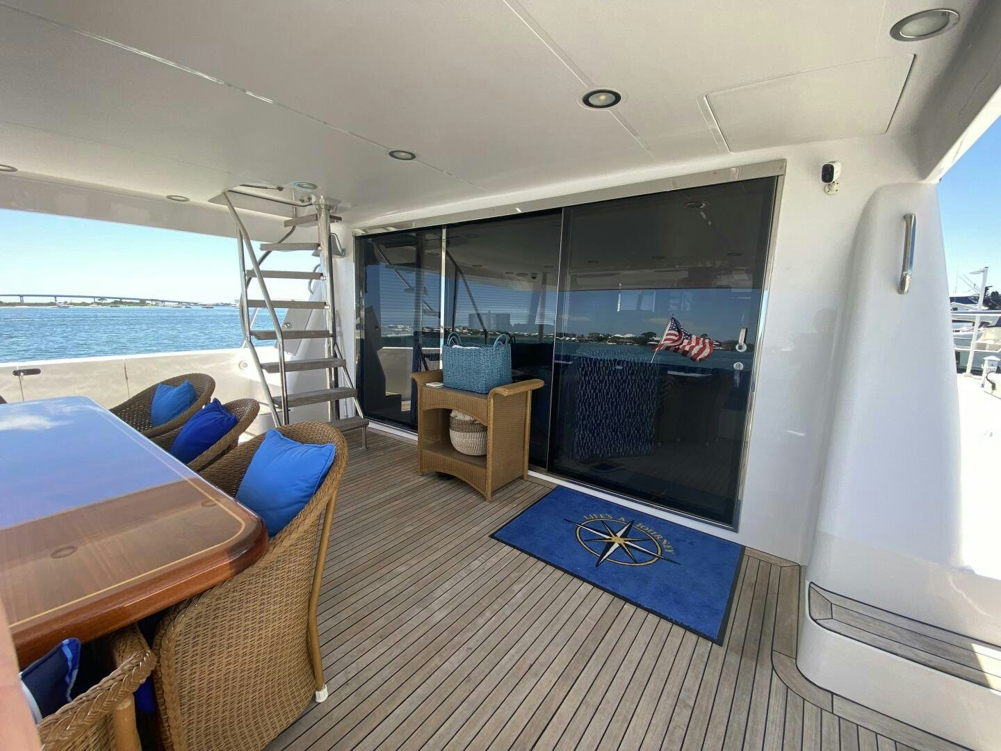 a room with a table and chairs aboard LIFE'S A JOURNEY Yacht for Sale