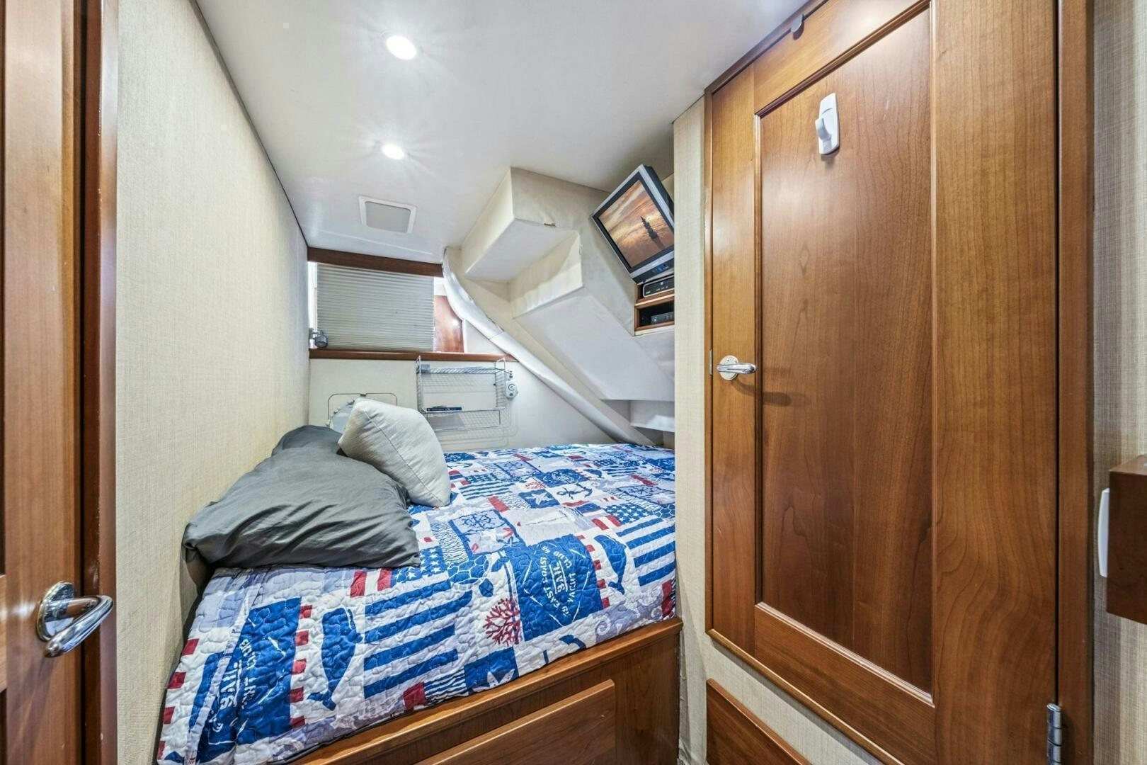 a bed in a room aboard LIFE'S A JOURNEY Yacht for Sale