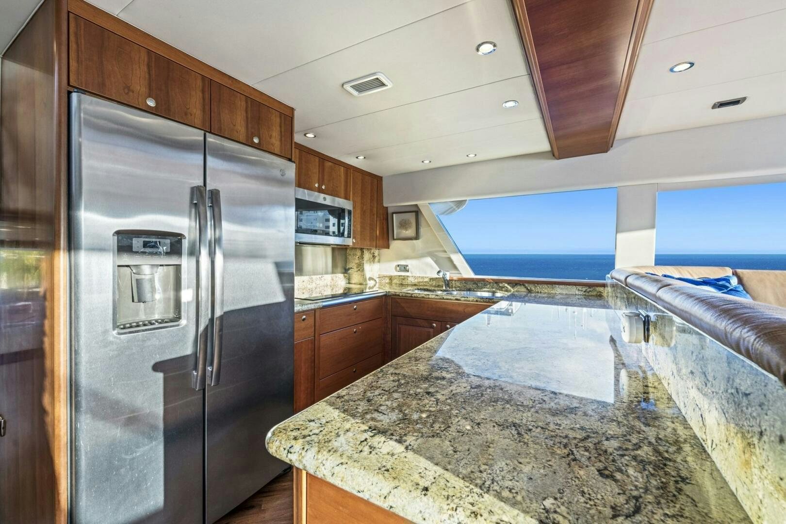a kitchen with a large marble counter top aboard LIFE'S A JOURNEY Yacht for Sale
