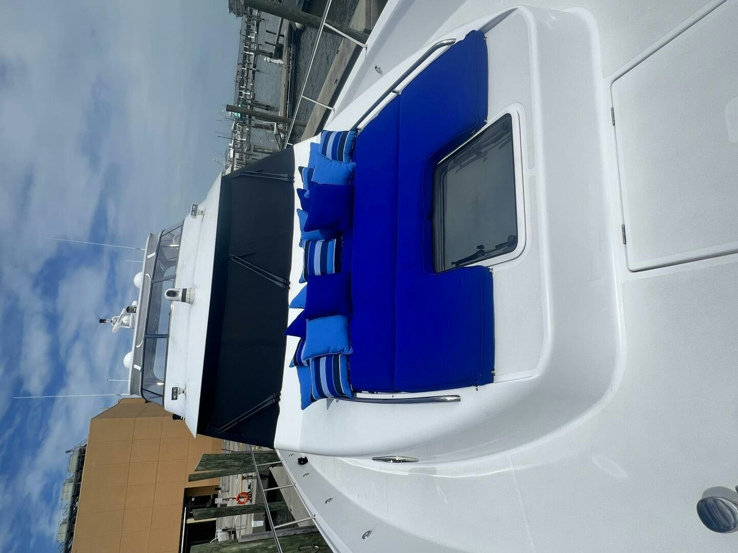 a white vehicle with a blue hood aboard LIFE'S A JOURNEY Yacht for Sale