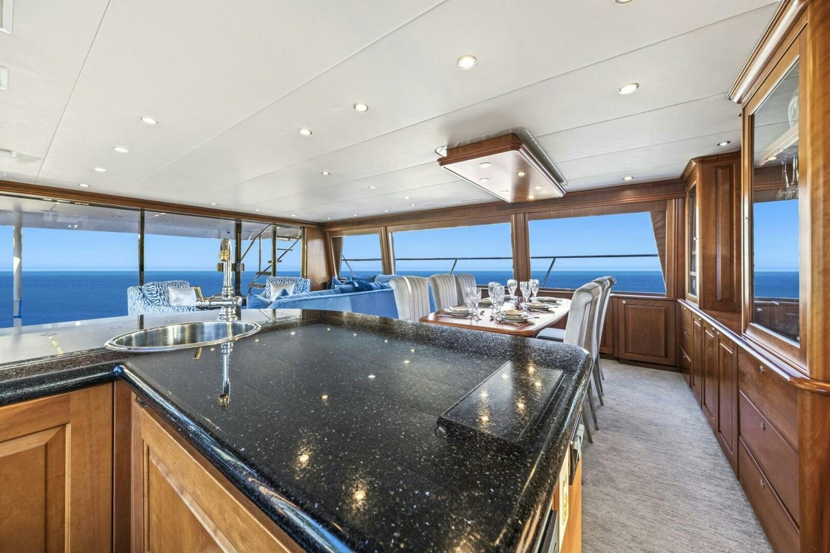 a kitchen with a large island aboard LIFE'S A JOURNEY Yacht for Sale
