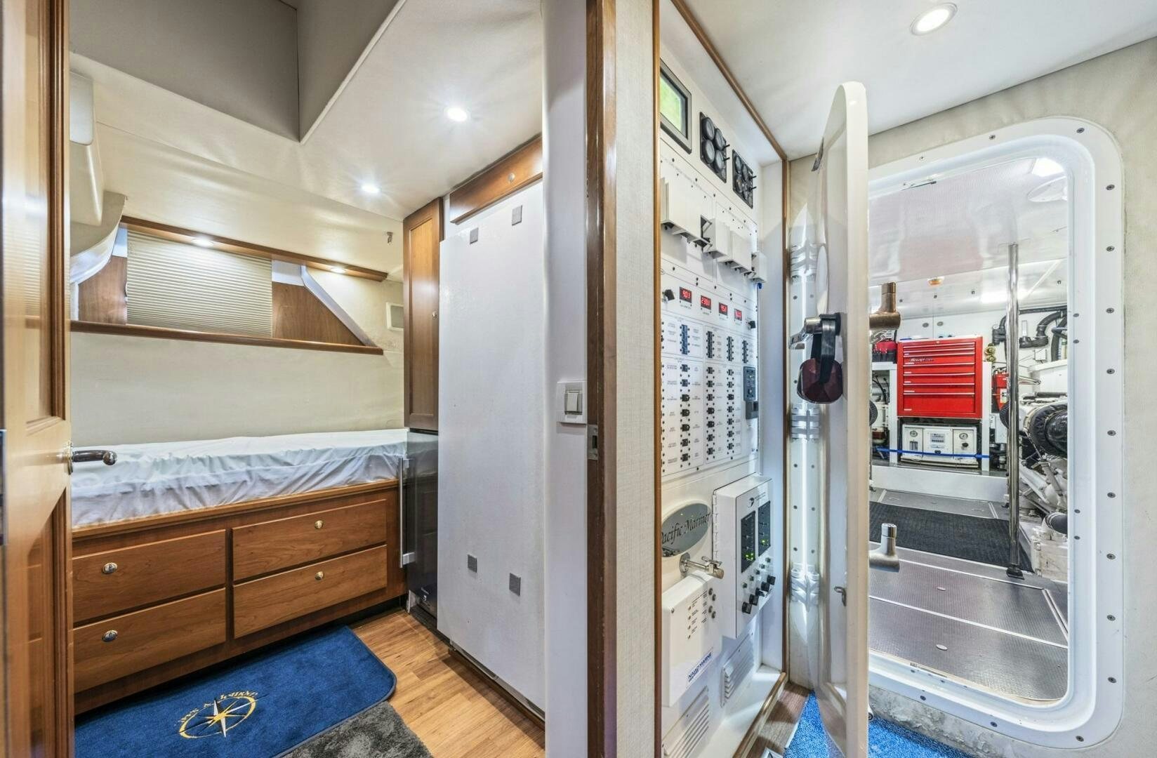 a room with a bed and a closet aboard LIFE'S A JOURNEY Yacht for Sale