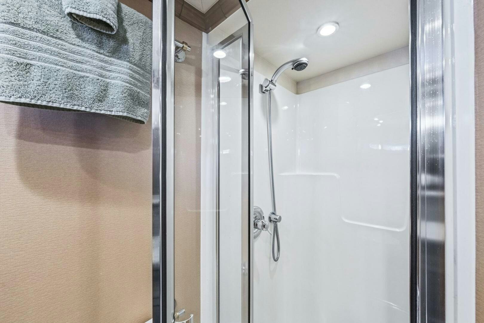 a bathroom with a towel rack aboard LIFE'S A JOURNEY Yacht for Sale