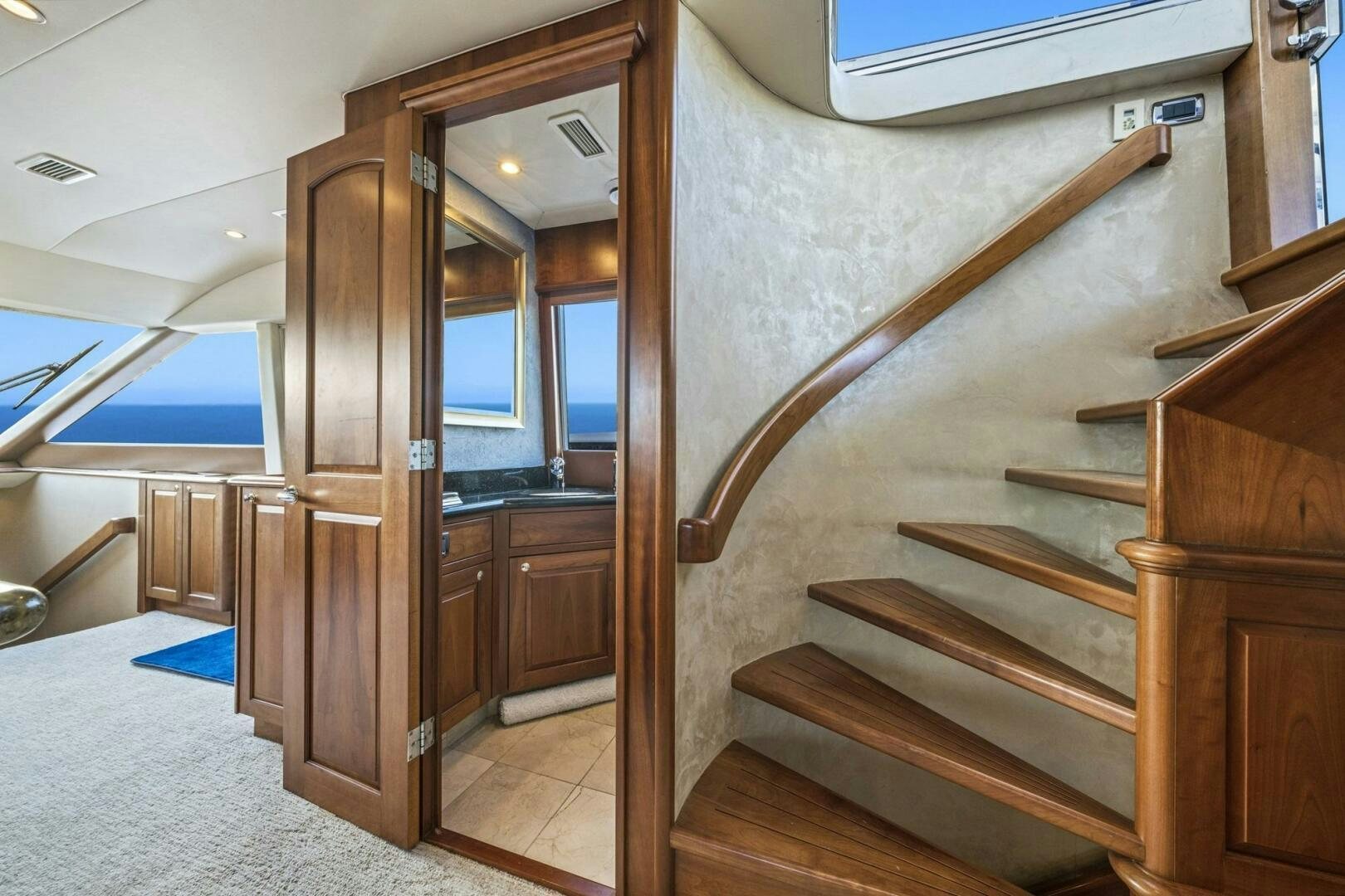a wooden staircase in a room aboard LIFE'S A JOURNEY Yacht for Sale