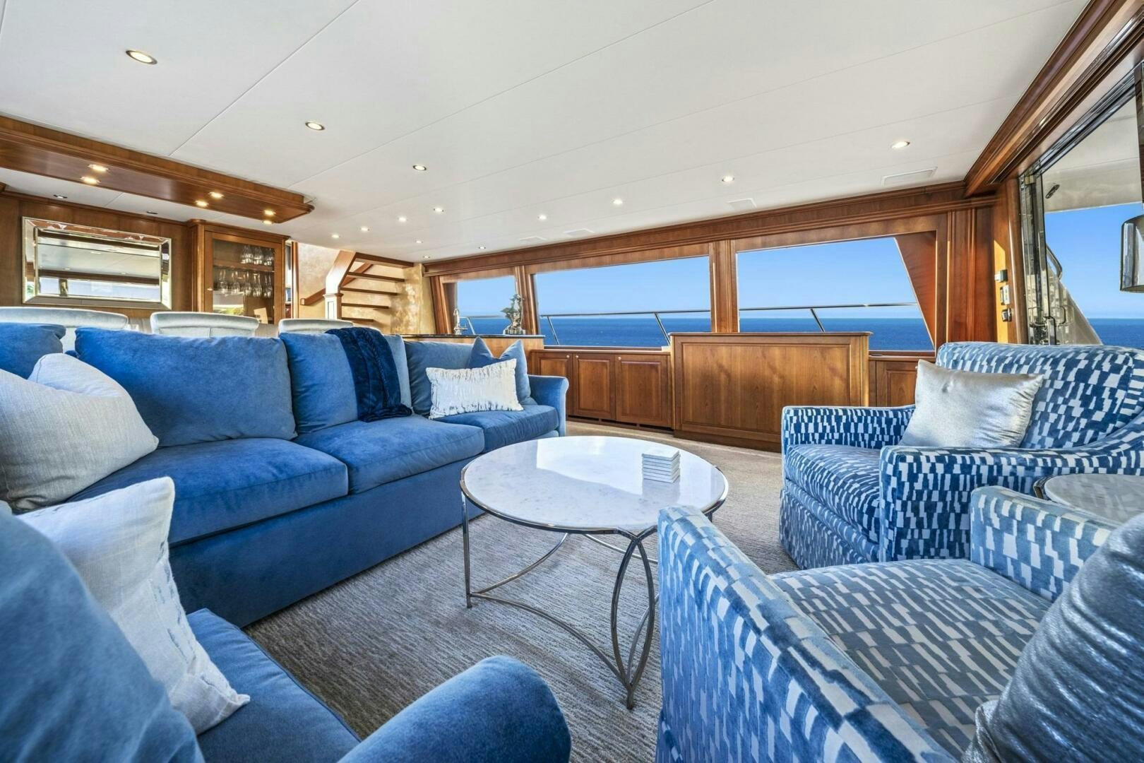 a living room with a couch and a table aboard LIFE'S A JOURNEY Yacht for Sale