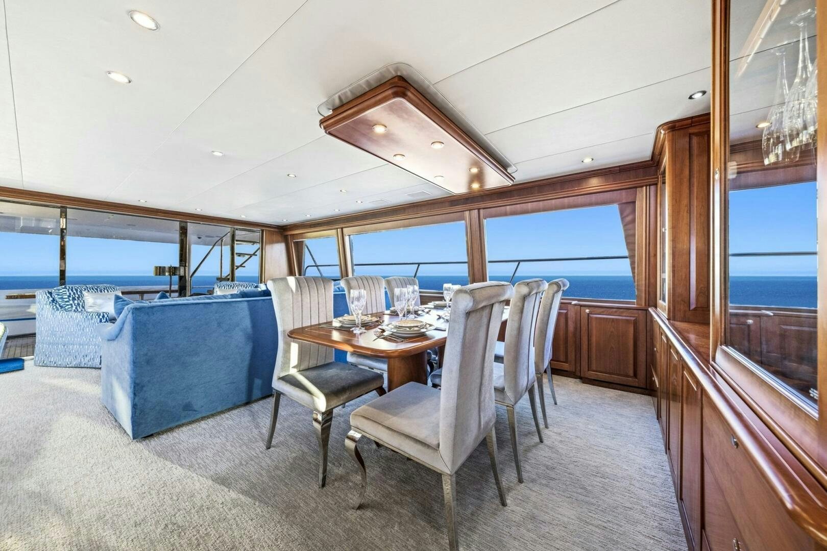 a room with a table and chairs aboard LIFE'S A JOURNEY Yacht for Sale