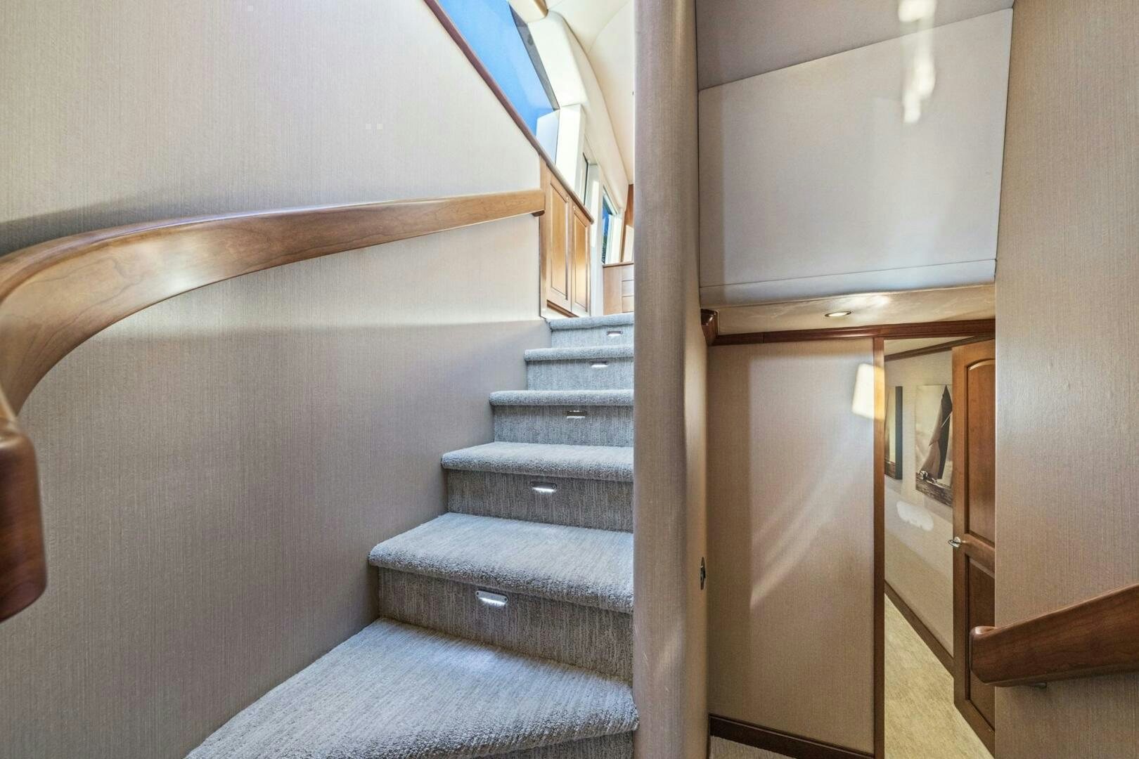 a staircase in a house aboard LIFE'S A JOURNEY Yacht for Sale