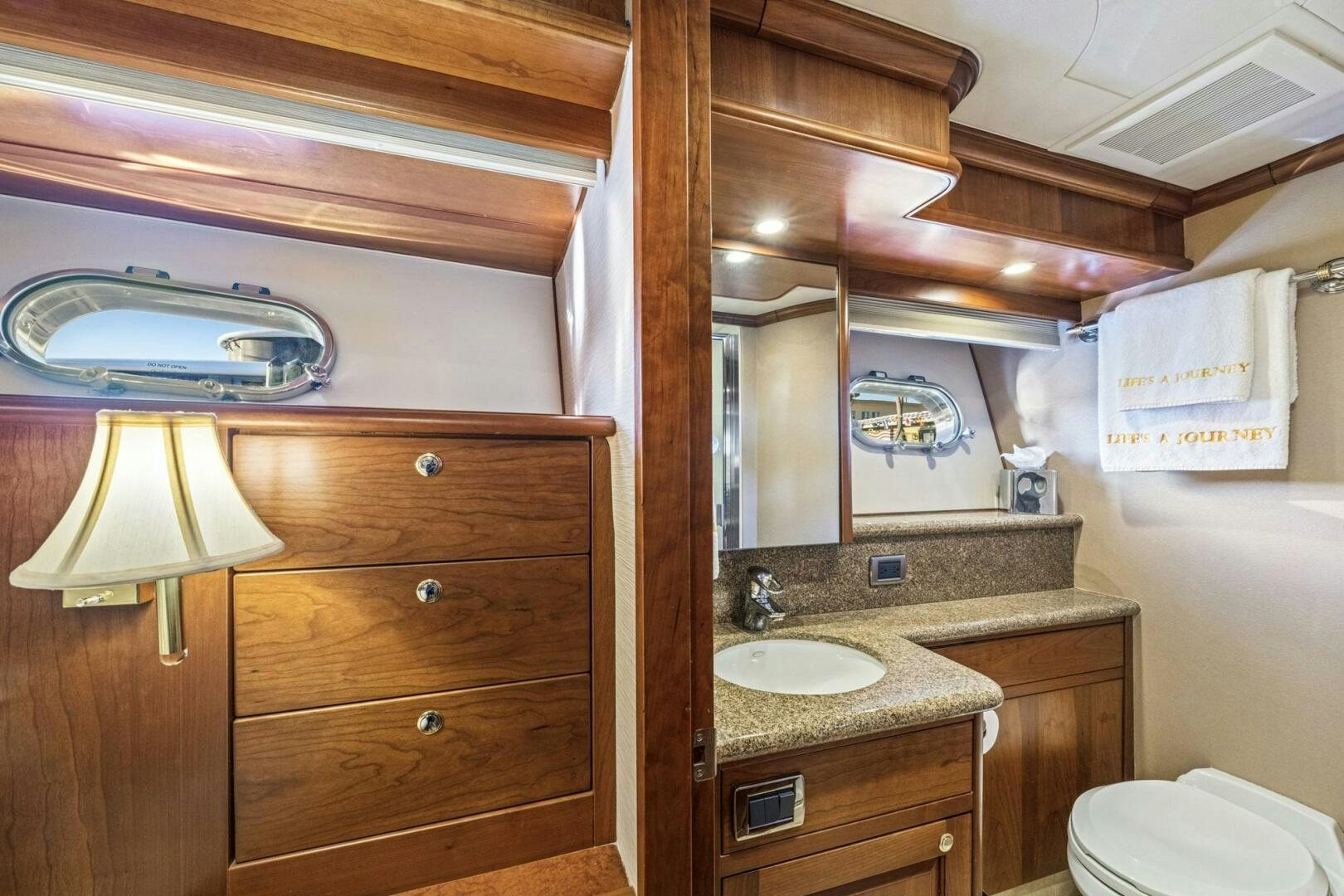 a bathroom with a sink and a toilet aboard LIFE'S A JOURNEY Yacht for Sale